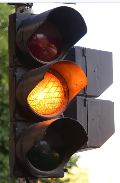 <p>Traffic Signals: What Is Steady (Regular) Yellow? What Do You Do At This Light?</p>