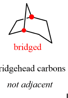 <p>contain a chain of one or more atoms that bridge a larger ring</p><p>atoms at the intersection of the larger ring and bridge - bridgehead atoms </p>