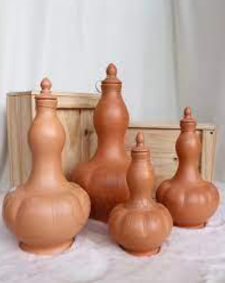 <p><span>earthenware water jar, both practical and decorative</span></p>