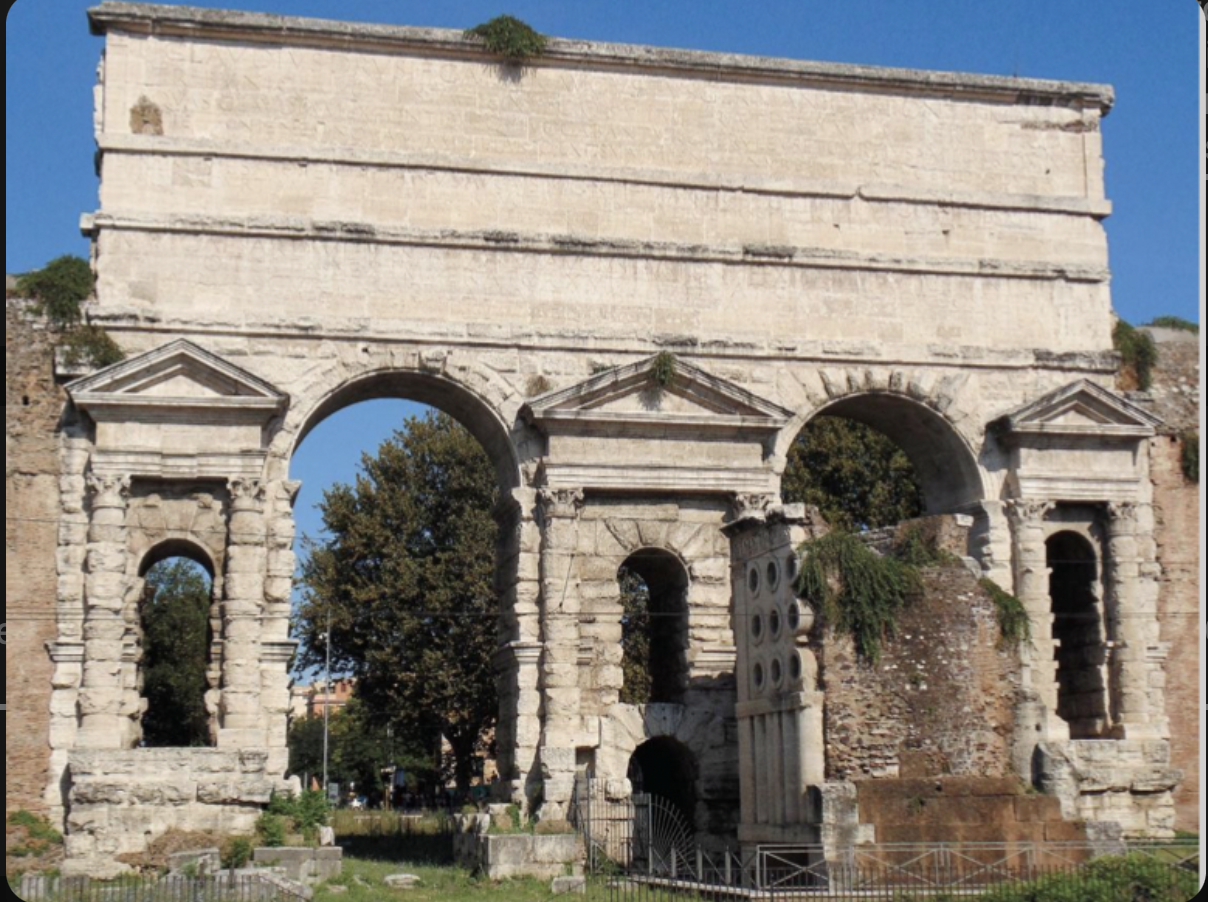 Porta Praenestina, an aqueduct gate, Rome 52 CE, at the top there are 2 channels where 2 aqueducts cross. 