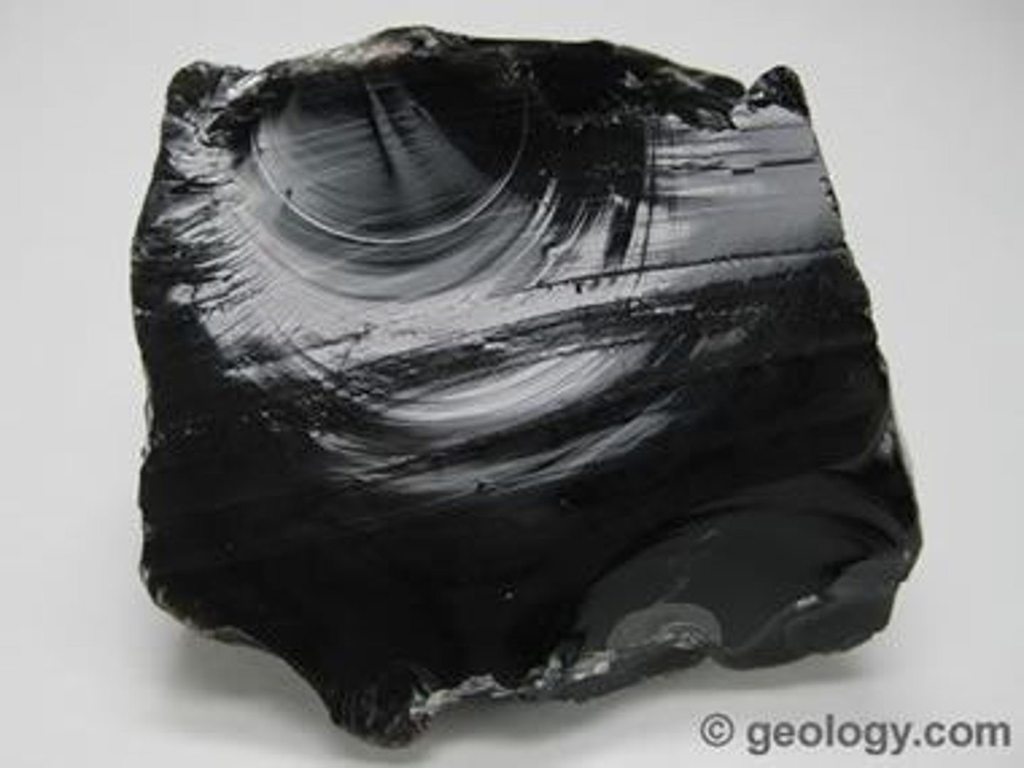 <p><strong>igneous rock</strong> that forms when molten rock material cools so rapidly that atoms are unable to arrange themselves into a crystalline structure. It is an amorphous material known as a "<strong>mineraloid</strong>." The result is a volcanic glass with a smooth uniform texture that breaks with a conchoidal fracture</p>