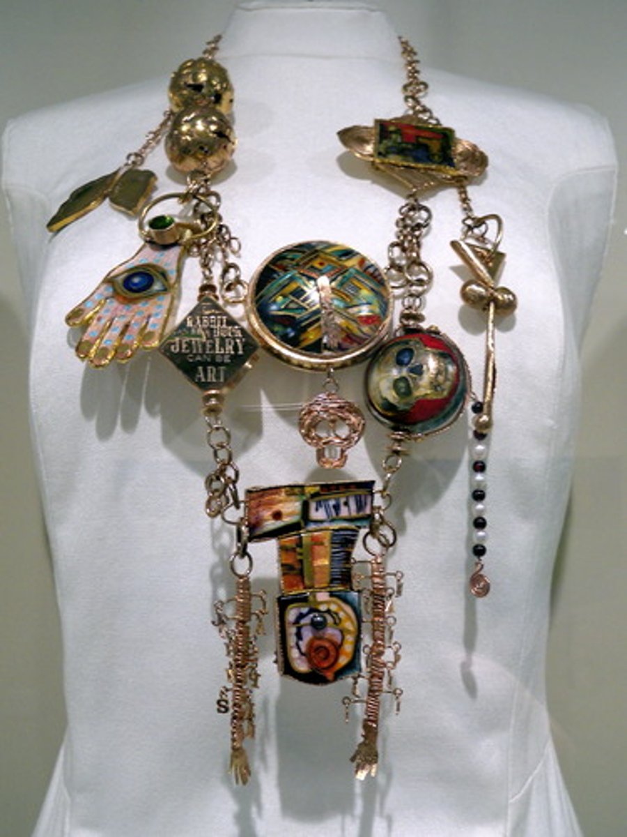 <p>ornament worn as a charm against evil spirits</p>