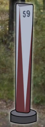 <p>Road marker with red triangle patterns</p>