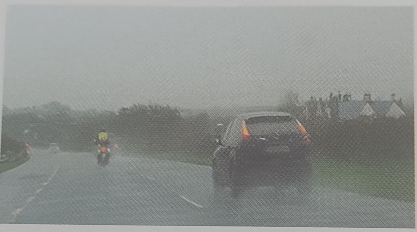 In this situation what should the driver in the right-lane of the dual carriageway be aware of?