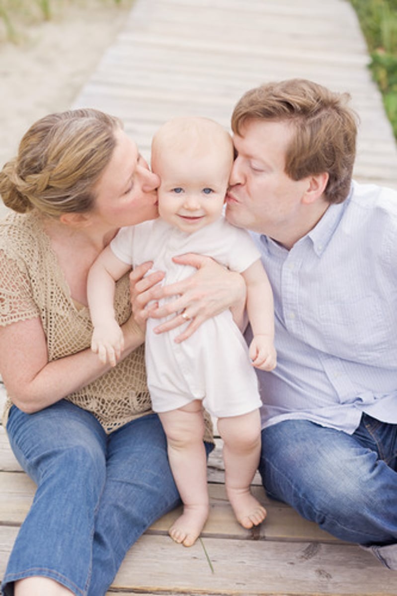 <p>shower with love; show excessive affection for</p>