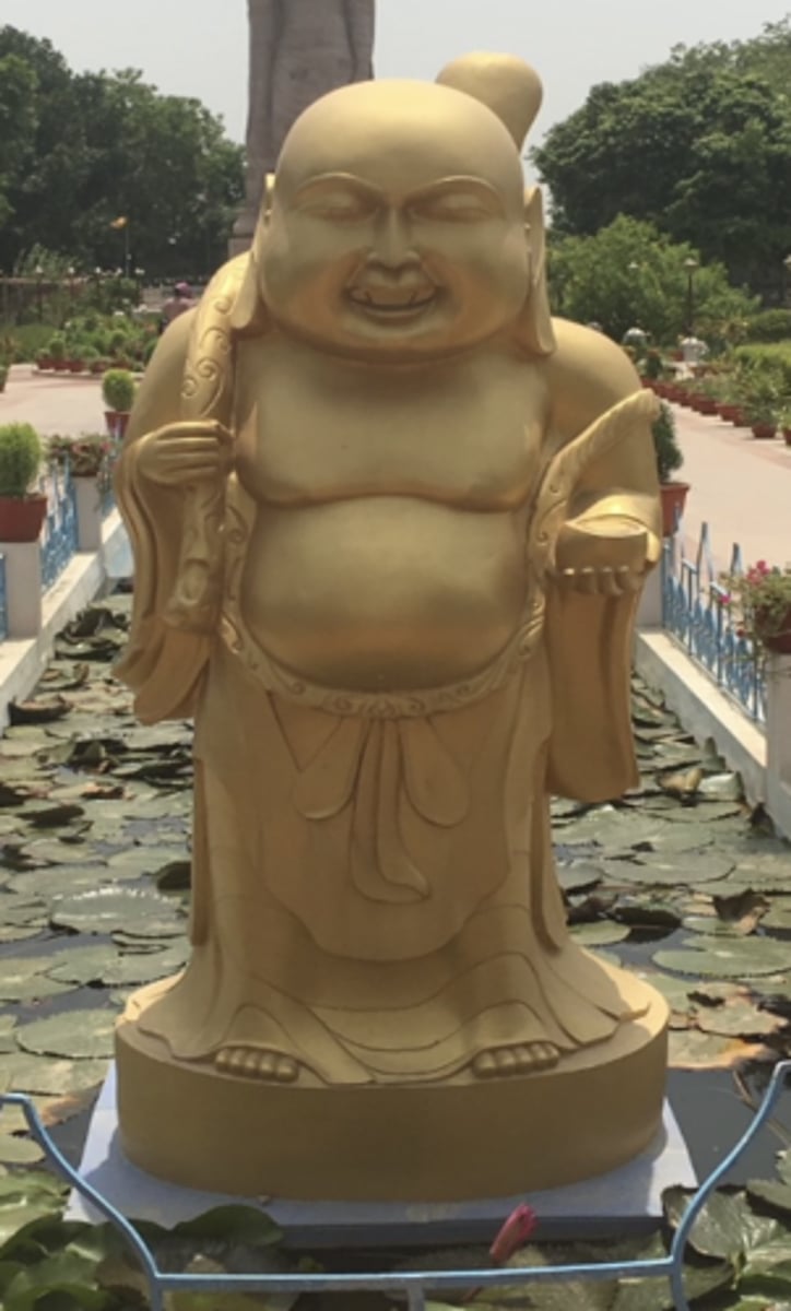 <p>happiness, future buddha</p>
