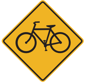 A bikeway crosses the roadway ahead. Watch for bicyclists. 