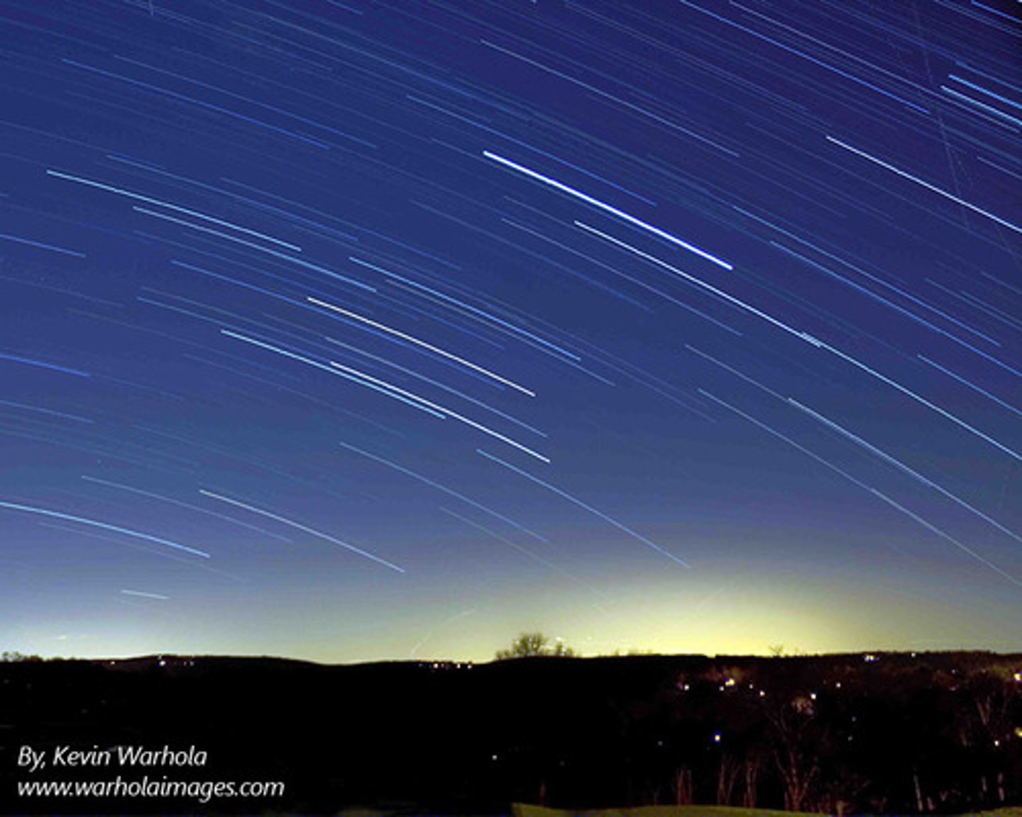 <p>In the northern hemisphere, stars move southward (to the right) as they rise and northward (to the right) as they set. If this figure were taken in the morning, the stars would be moving in the wrong direction.</p>