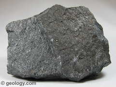 Dark Gray - Black
Streak: Dark Gray 
Luster: Metallic
Hardness: 6
Cleavage: None Apparent
Other Properties: MAGNETIC