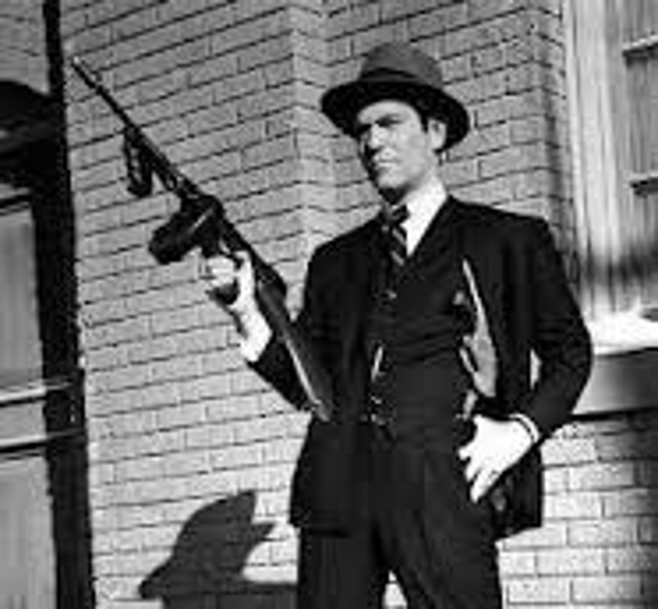 <p>People who obtain money illegally by fraud, bootlegging, gambling, or threats of violence. Racketeers invaded the ranks of labor during the 1920s, a decade when gambling and gangsterism were prevalent in American life.</p>