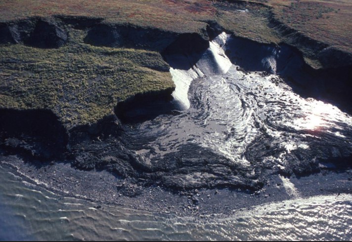 * ice that crystallizes in pores between grains of sediment
* picture: Mudflow formed by melting interstitial ice in permafrost, Mackenzie River near Inuvik, Northwest Territories