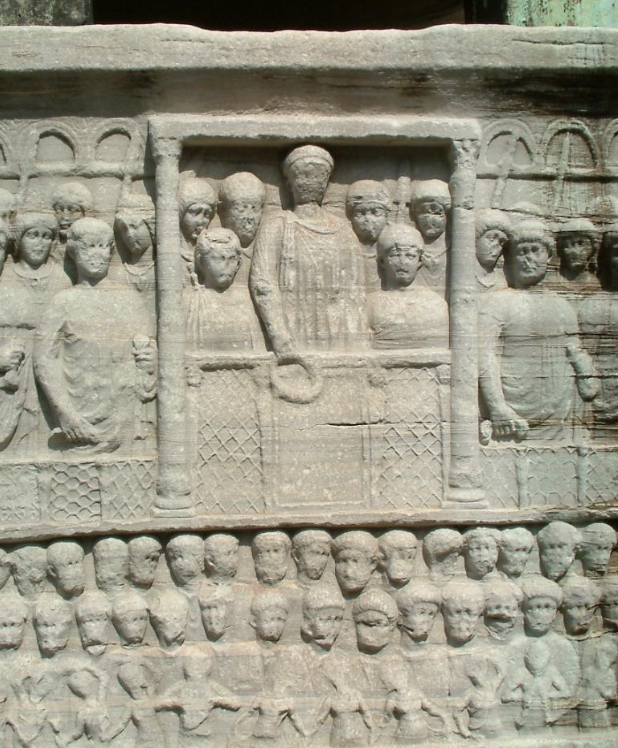 <p><span style="color: purple;"><span>Theodosius I and attendants, relief on the southeast side of the pedestal of the obelisk<br>erected in the hippodrome of Constantinople (Istanbul), Turkey, 390.</span></span></p><p><span style="color: purple;"><span><br></span></span></p>