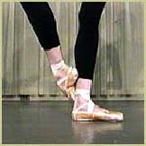 <ol><li><p>Sur = on — Cou-de-Pied = neck of the foot</p></li><li><p>From 5th position on the right, sliding the pointed right foot up the front of the leg, wrapping the foot around the ankle the heel resting on the front of the ankle and the toes reaching backwards</p></li></ol><p></p>