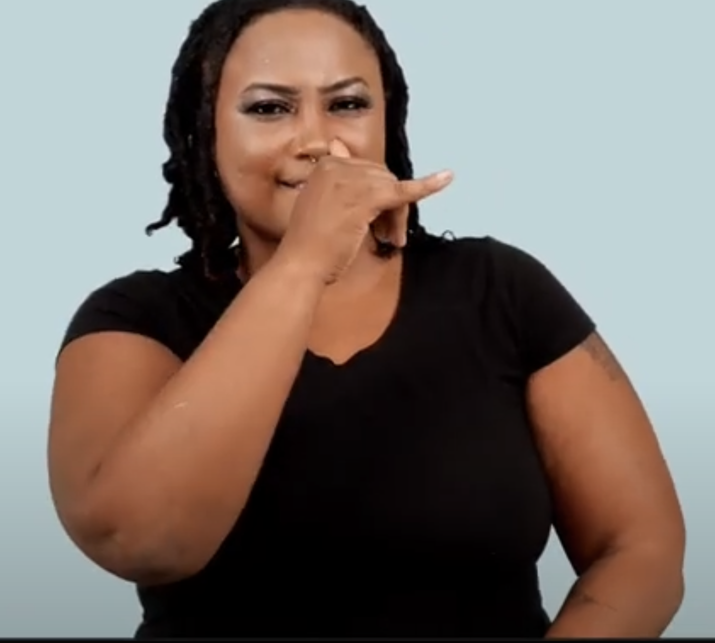 <p>wiggle the thumb and pinky in front of your mouth</p>