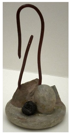 <p>What best describes the balance, emphasis, and movement of the Red Wire Sculpture?</p>