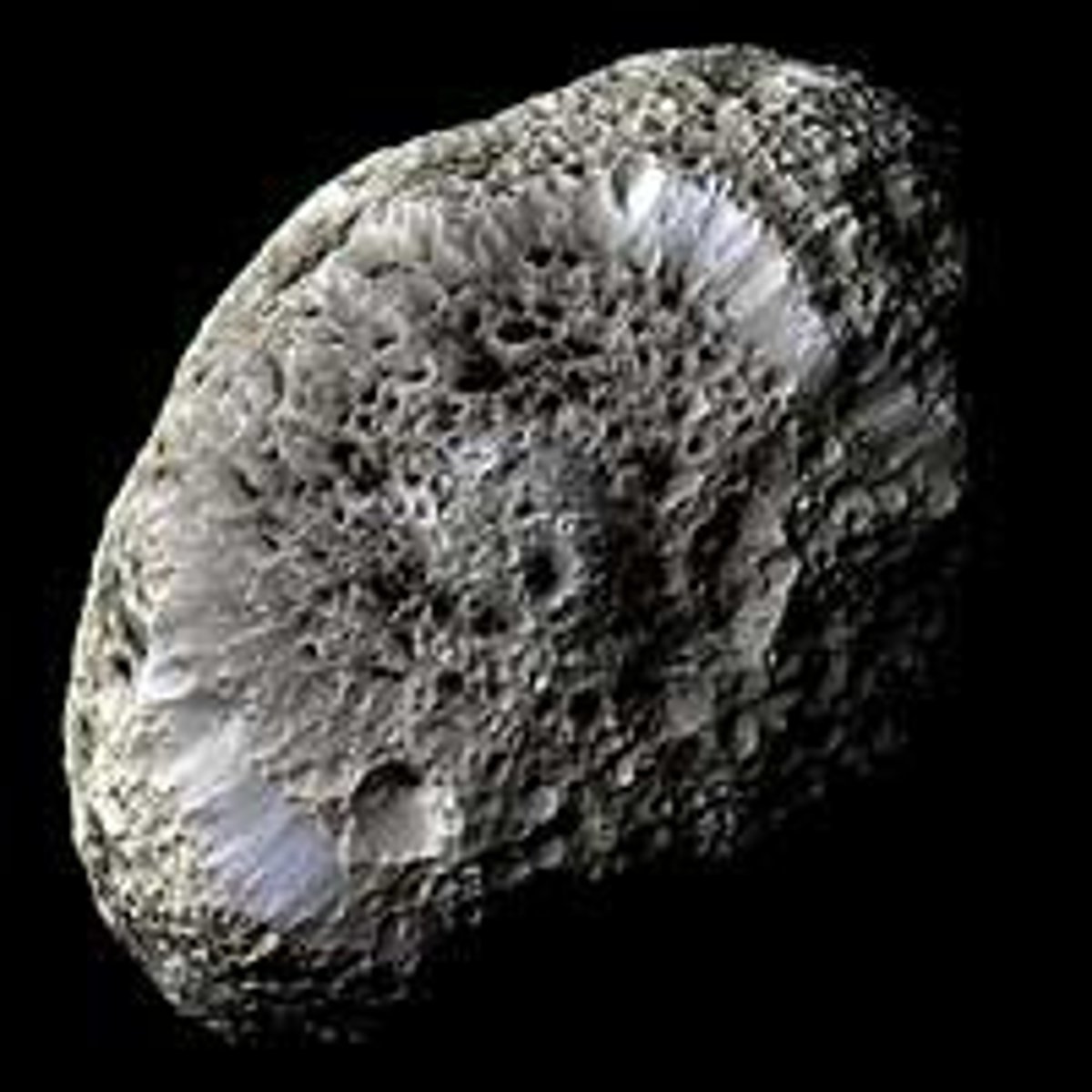 <p>Hyperion, also known as Saturn VII, is a moon of Saturn discovered by William Cranch Bond, George Phillips Bond and William Lassell in 1848. It is distinguished by its irregular shape, its chaotic rotation, and its unexplained sponge-like appearance. It was the first non-round moon to be discovered. Wikipedia</p>