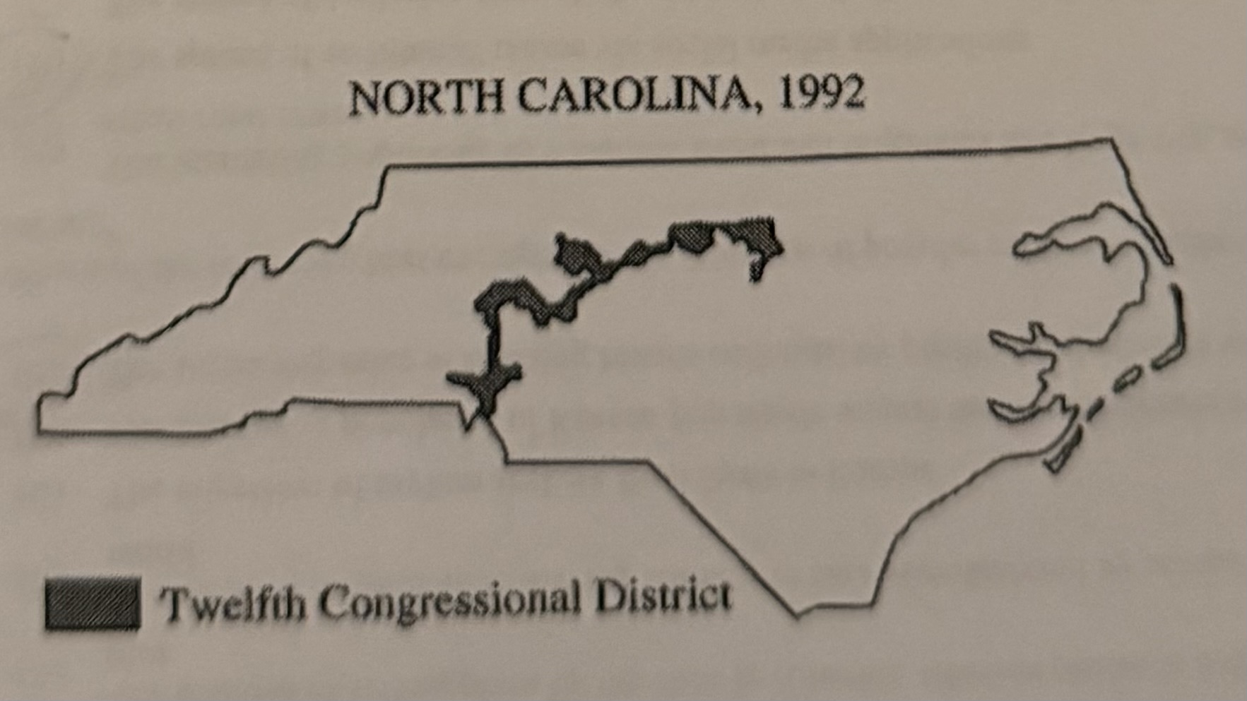 <p>the shape of North Carolina’s 12th congressional district, shown above, is most likely the result of</p>