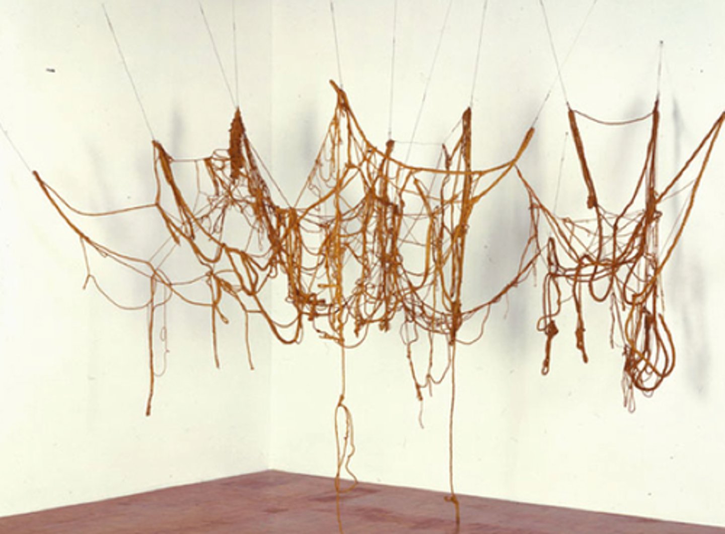 <p>A massive installation of latex-covered rope that could be reconfigured for each installation, representing a "3D Jackson Pollock".</p>