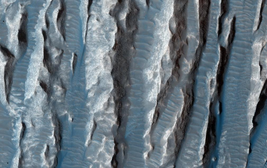 <ul><li><p>Yardangs: wind-abraided ridge found in desert environments - few impact craters - erosion still occuring </p></li><li><p>Dust devils</p></li></ul><p></p>