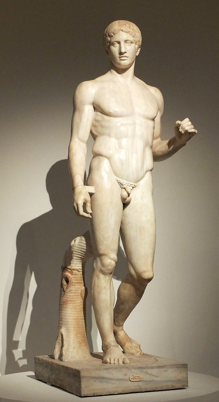 <p>Polykleitos, it exemplifies the Classical Greek canon of proportions, demonstrating balance and idealized human anatomy.</p>