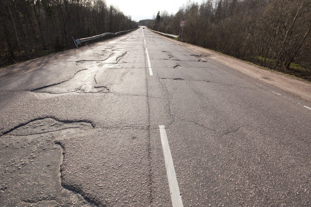 <p><strong>Depths of such holes are deceptive; to prevent losing control of the vehicle, slow down, keep the tires away from it and take a different path/alternative route to pass.</strong></p>