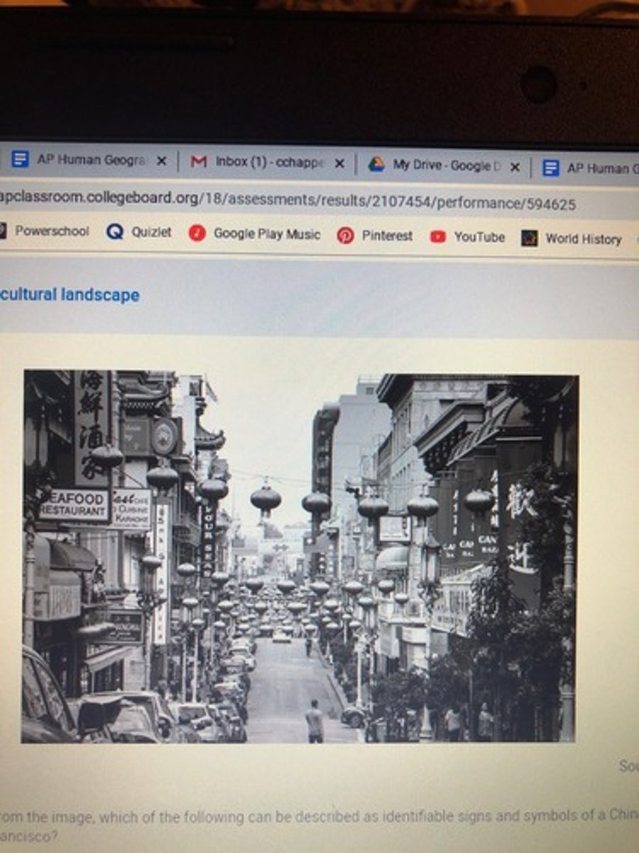 <p>Chinese language signs and Chinese lamps.</p>