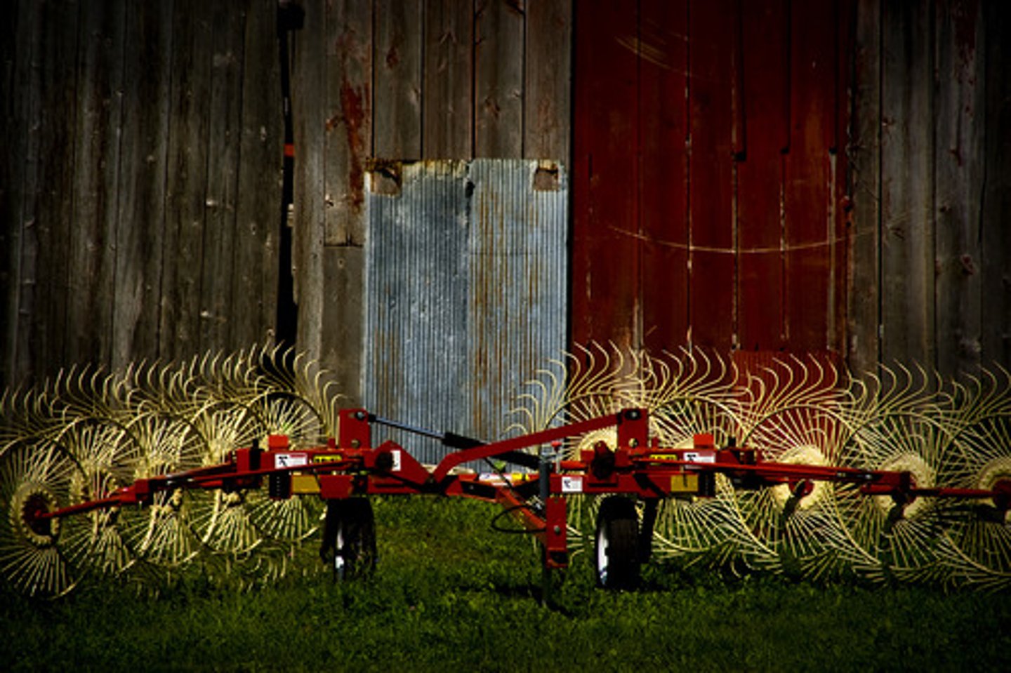 <p>agricultural rake used to collect cuts of hay or straw into windrows for later</p>