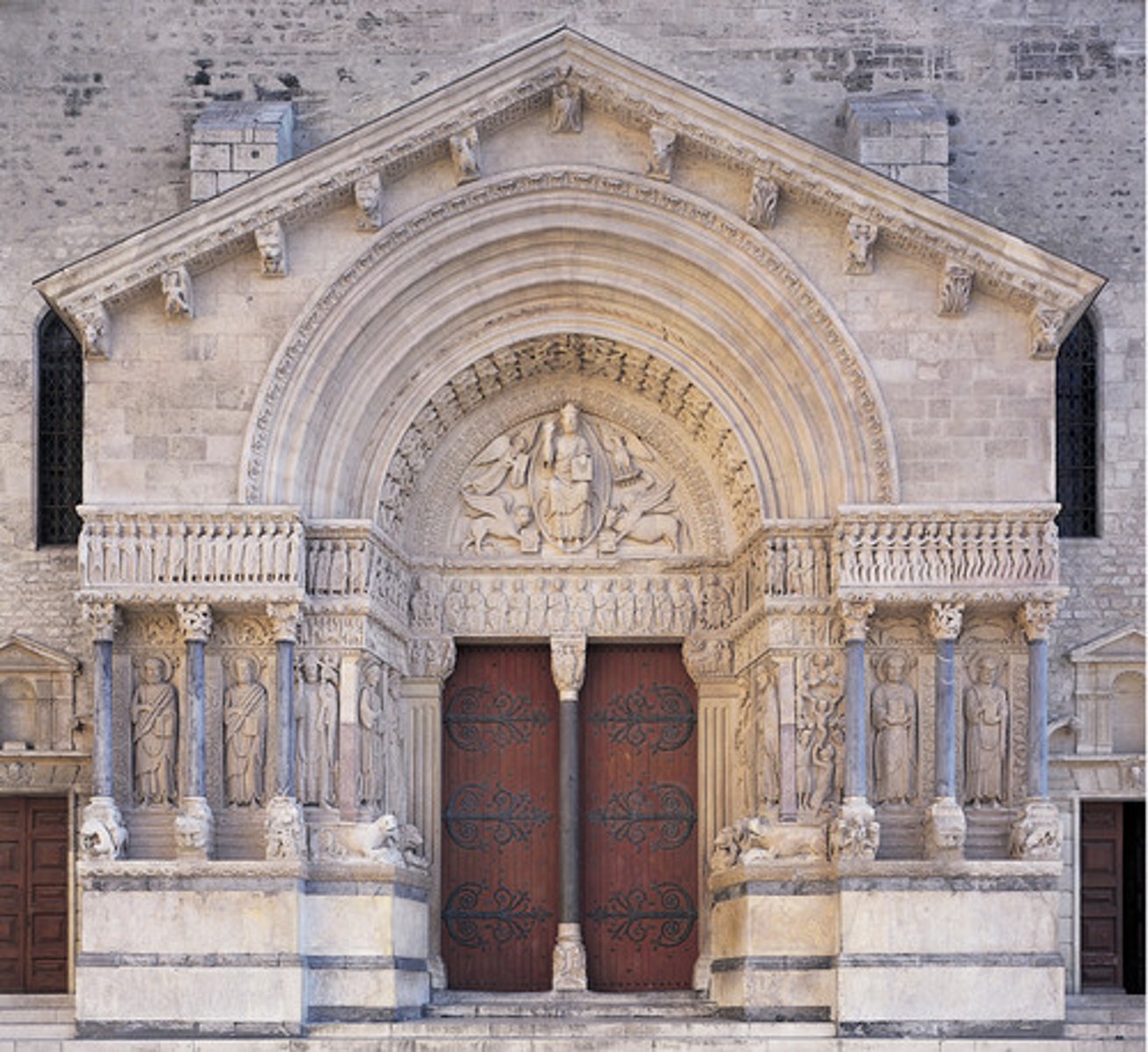 <p>1180 AD</p><p>Arles, France, pictures of the last judgement, 12 disciples under Christ, above Christ is 4 disciples as animals holding books ready to make a case for the gospel on Judgement day</p>
