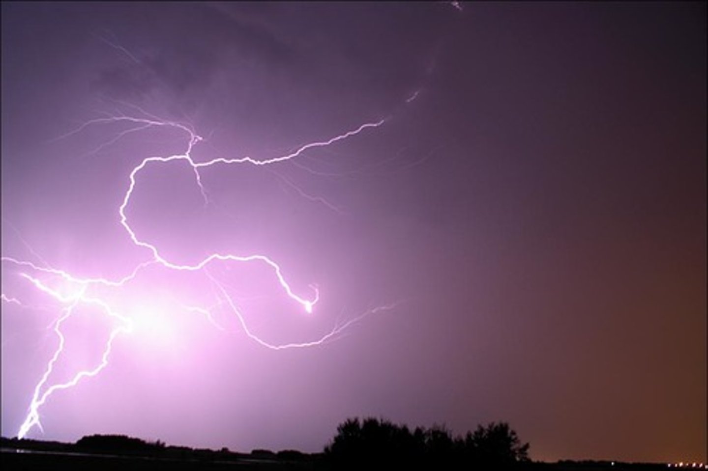 <p>simile - Juliet compares their "contract", or promises of love, to lightning. It is sudden and quick - lightning disappears from the sky before you can say there was lightning.</p>