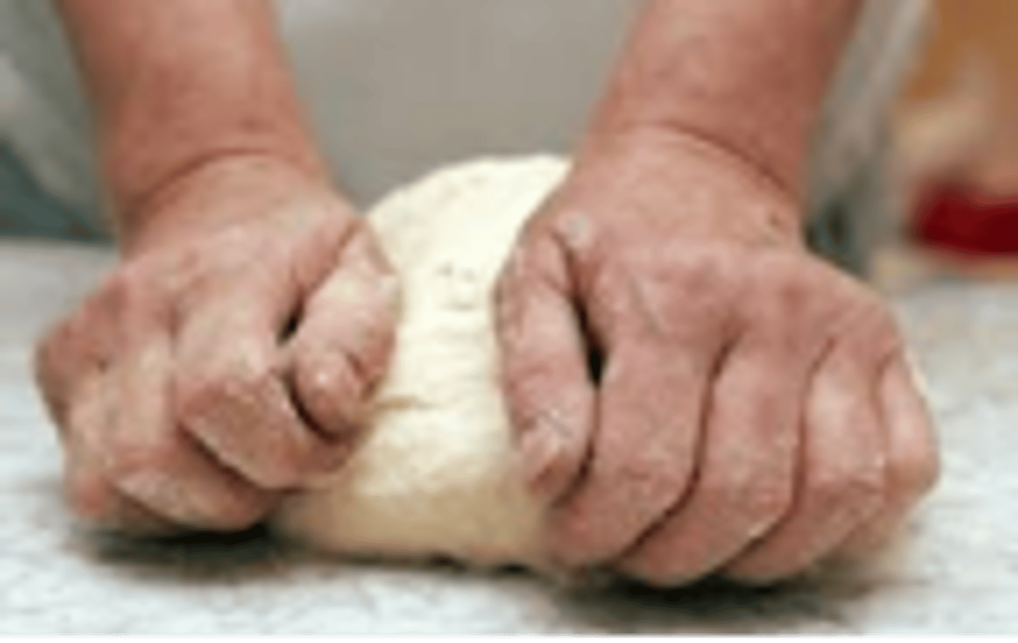 <p>v. to work dough or clay into a uniform mixture</p>