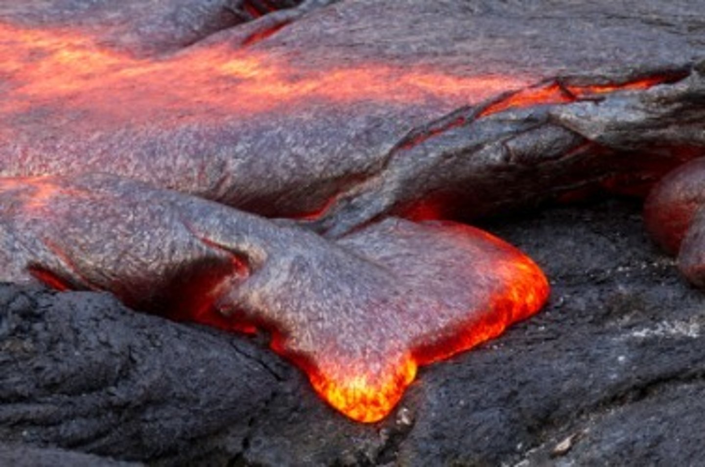 <p>Dark magma that makes gentle, flowy eruptions (pahoehoe & aa are examples)</p>