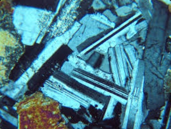 <p>colorless, 2 cleavage planes 90, low relief, no pleochroism, inclined extinction, polytheistic twinning, and igneous and metamorphic </p>