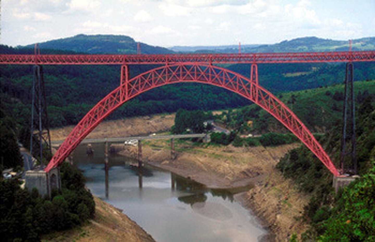 <p>AN AERIAL ROADWAY OR WATERWAY carried on a series of arches.</p>