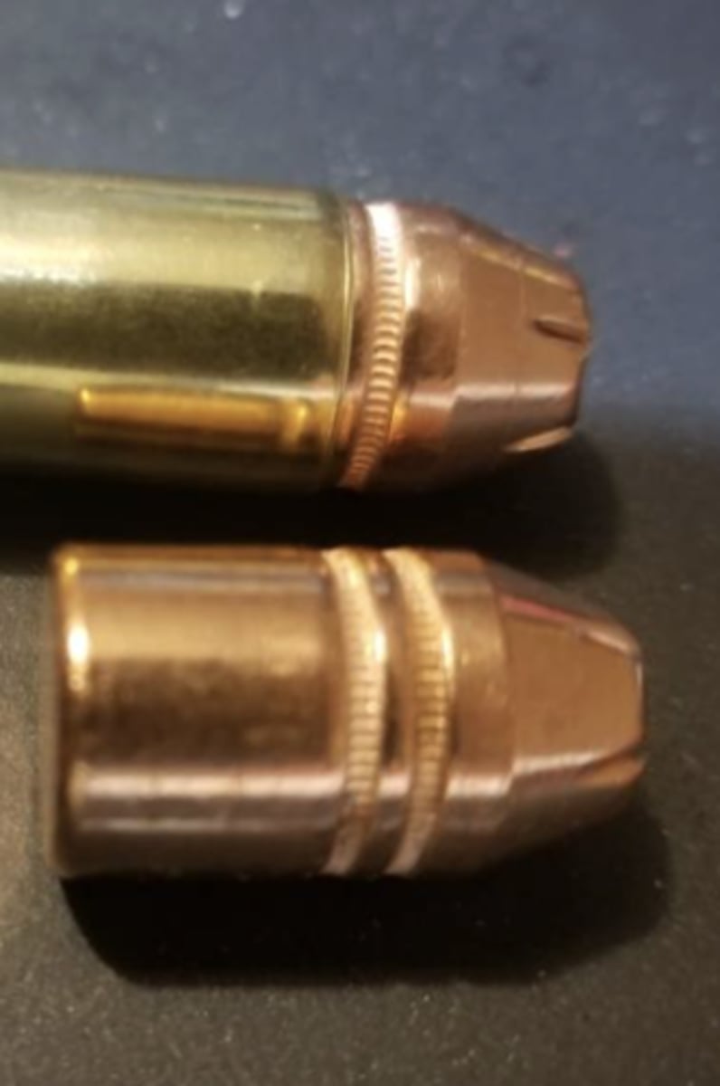 <p>-Groove/ridge around the cylindrical part of the bullet (perpendicular to rifling)</p><p>-Allows cartridge case to grip the bullet until the gunpowder builds enough pressure to eject the bullet</p>