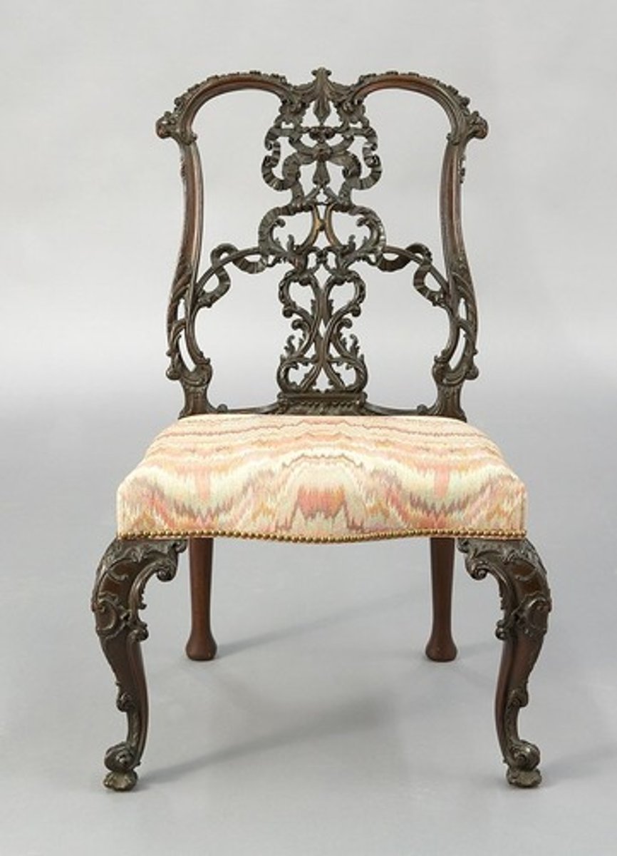 <p>Chair designed by Thomas Chippendale with scroll and interlacing ribbon work at the back of chair.</p>
