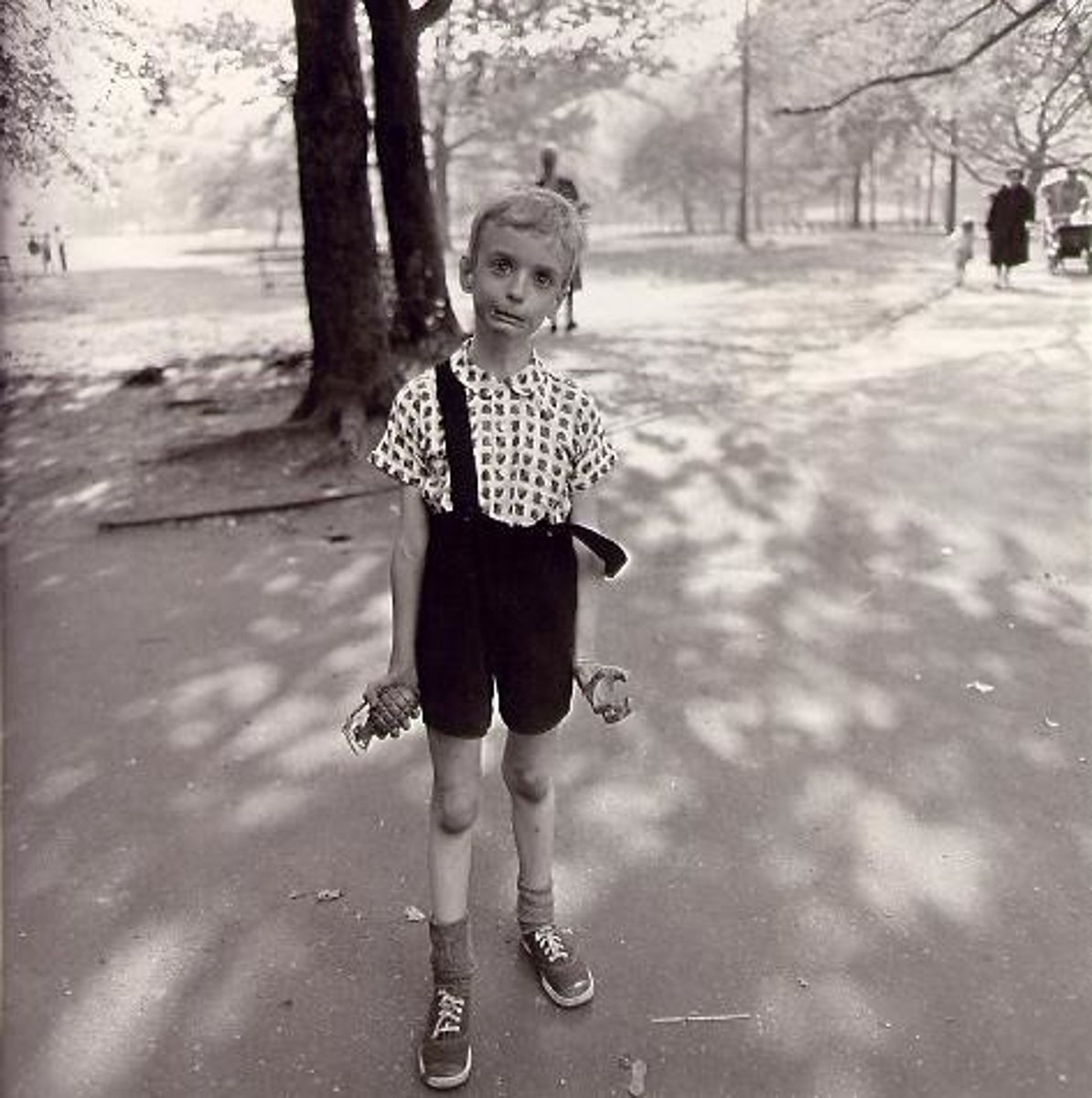<p>Child With Toy Hand Grenade in Central Park</p>