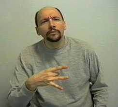 <p><span style="font-size: medium">eight handshape. start the sign a bit out from my chest with my middle finger and thumb pointing back toward my chest (but not touching either my chest or each other).&nbsp;Then I move the hand forward while bringing the index and thumb together.</span></p>
