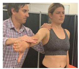 <ul><li><p>Positive test: reduction in pain</p></li><li><p>Thumb down</p></li></ul><p>Testing for: Scapular Dyskinesis </p>