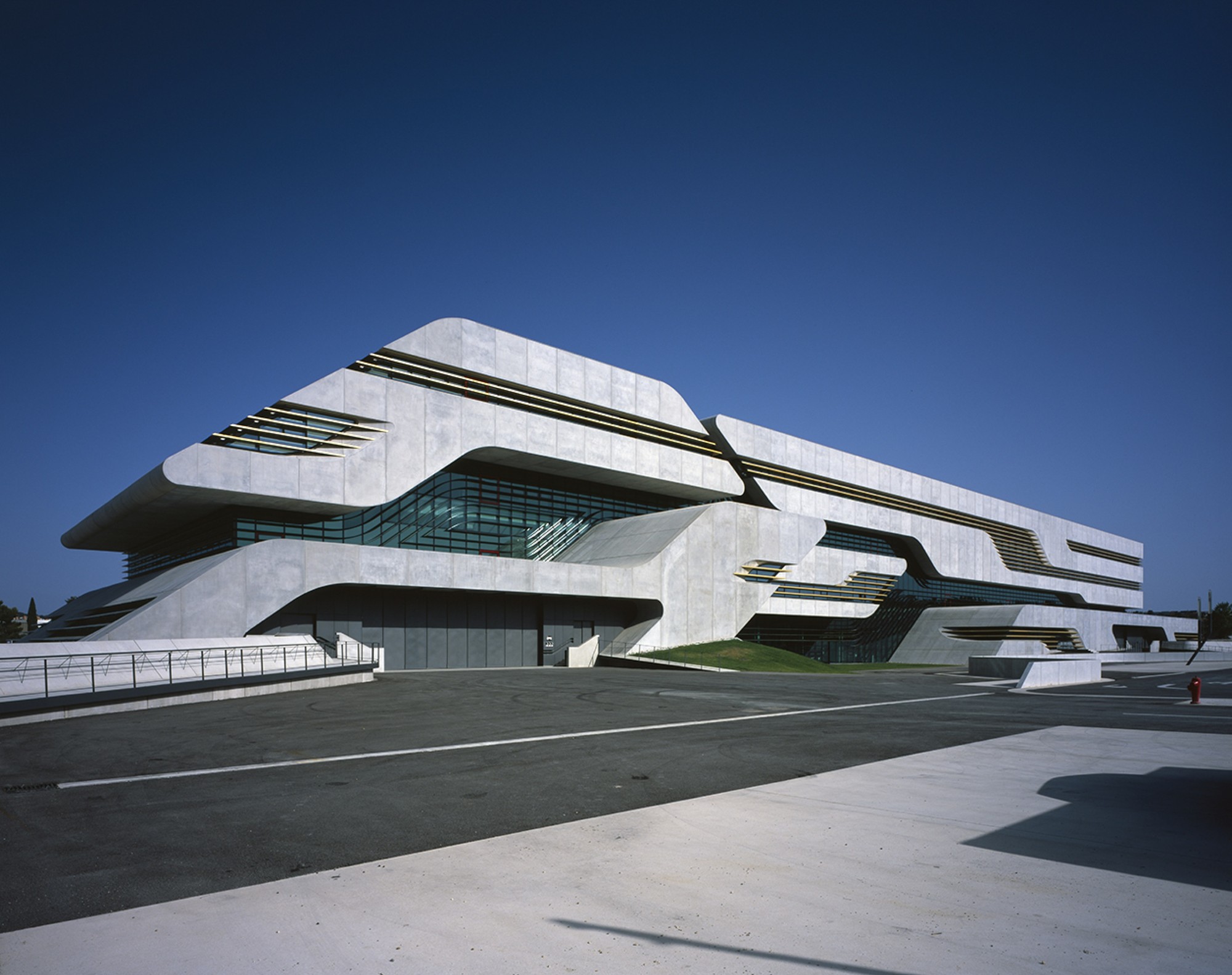 <p>The concrete-and-glass __________ building in Montpellier, France, will house three government departments.</p>
