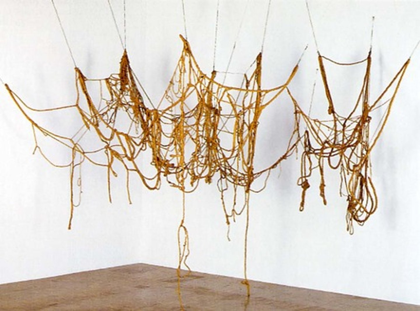 <p>Eva Hesse</p><p>1970</p><p>Notes: Born in Germany. War started when she was a little girl so she had to leave to England. Started new life in New York. Parents divorced and mother committed suicide. Talented artist who went to Yale.</p><p>Commissioner:</p><p>Original Location:</p><p>Style: Abstraction, Non-objectivity. Abstract sculpture. (Minimalist and Post-minimalist sculpture)</p><p>Characteristics: Rubberized string suspended. Mutable sculpture. Qualities of line, realm of drawing.</p><p>Subject:</p><p>Function: If you wanted to display this work in a museum, you wouldn't know how to hang it. Never hung the same way twice. Uncertainty of the work of art.</p>