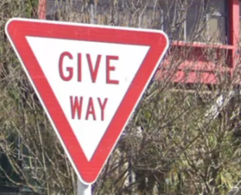<p>Give way sign in red</p>