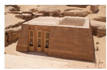 An Egyptian tomb w/a flat top & slopping sides built over A grave shaft