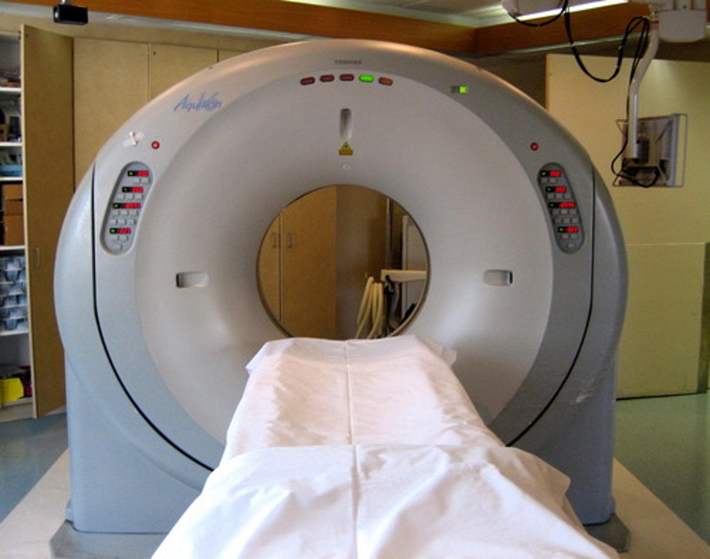 <p>Takes X-ray images to create cross-sectional pictures of the brain; useful for finding injuries or tumors.</p>