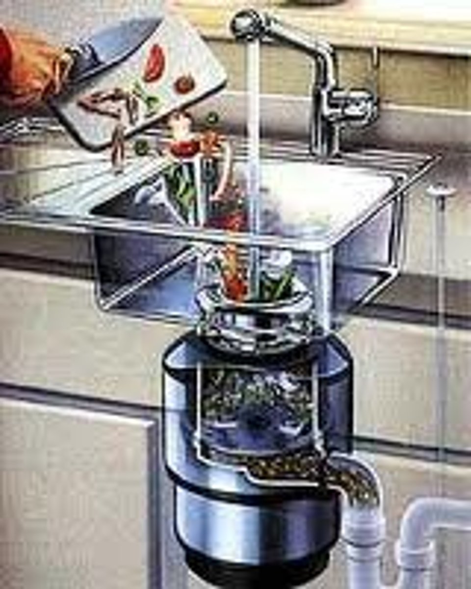 <p>an electrical device in the drain of a sink, for grinding food wastes to be washed down the drain</p>