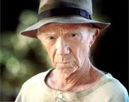 <p>an old man who works on the farm and has an old dog</p>