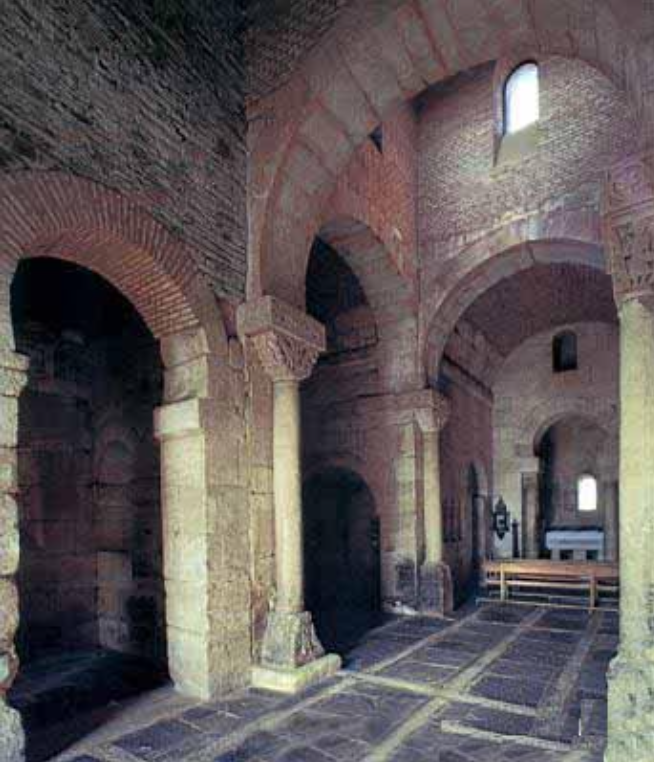 <p><strong>Visigothic Era Church</strong></p><p>Either <strong>Basilica Plan Church</strong> (type of church layout) Dedicated to Saint John the Baptist</p><p>or Greek Cross Plan, (or mixed cross inside a rectangle)</p><p></p><p>A Basilican church plan  is a classic, long, rectangular building design</p><ul><li><p>Small</p></li><li><p>Straight Apse (rounded, semi-circular  room extension at end of church)</p></li><li><p>Horseshoe Arches</p></li><li><p>Decorative Columns</p></li></ul><p></p>