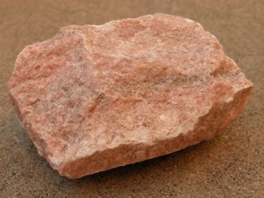 <ul><li><p>low-intermediate grade</p></li><li><p>associated mineral: calcite</p></li><li><p>calcite crystals recrystallise</p></li><li><p>protolith: limestone</p></li></ul><p></p>