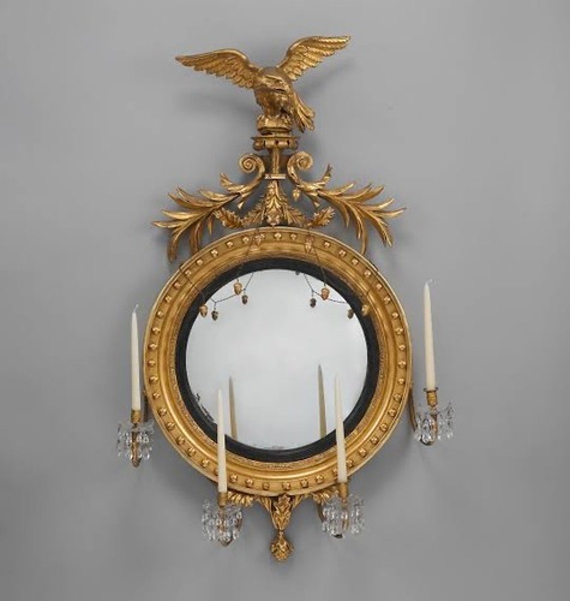 <p>What is a French decorative candle holder often a mirror with a candle holder on either side ?</p>