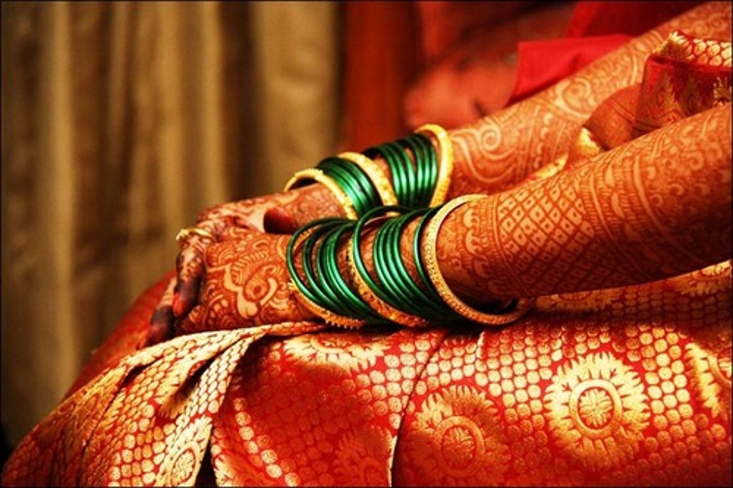 <p>1. Symbolises an Indian woman's suhaag</p><p>2. Auspiciousness in marriage</p><p>3. Red veil</p><p>4. Hands dyed with henna</p><p>5. Red bangles rolled onto the wrists</p>