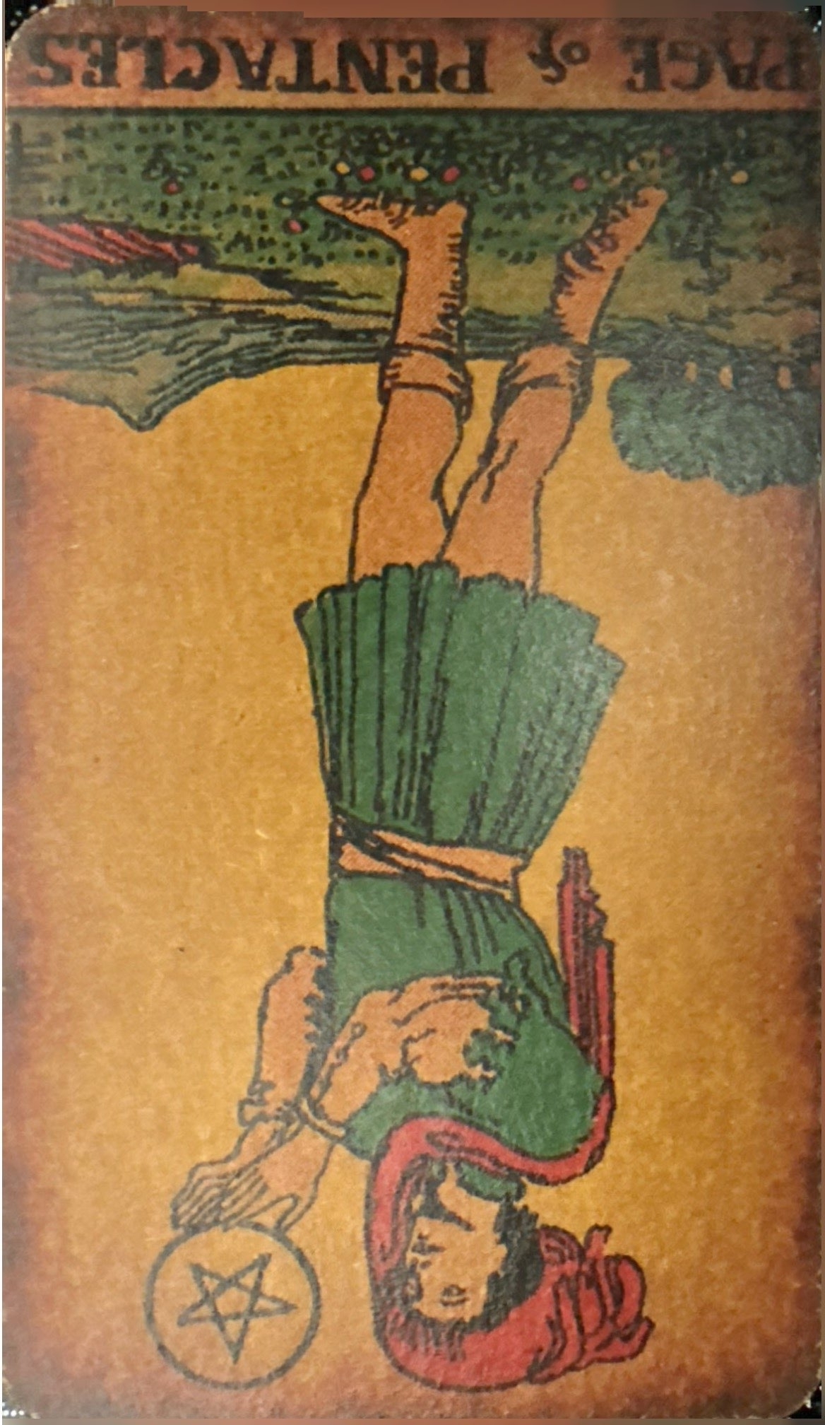 <p>XI - Page of Pentacles (Reversed)</p>